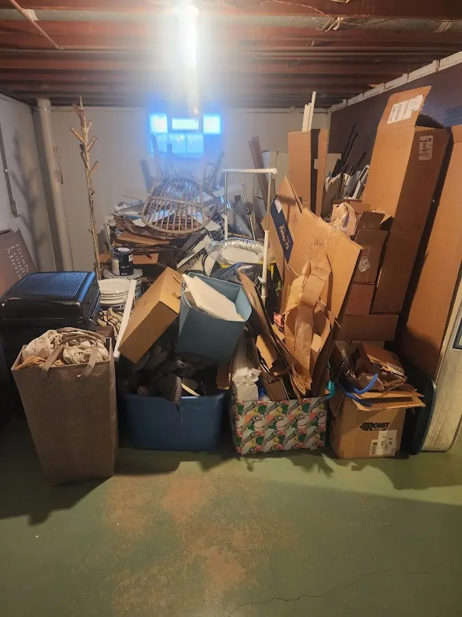 Roll-off dumpster container at job site for 20 Yard Dumpster Rental in Stowe